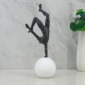 Willow Polyresin Man Balancing On Ball 30Cm in Black And White Colour