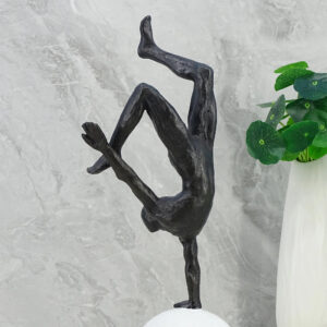 Willow Polyresin Man Balancing On Ball 30Cm in Black And White Colour